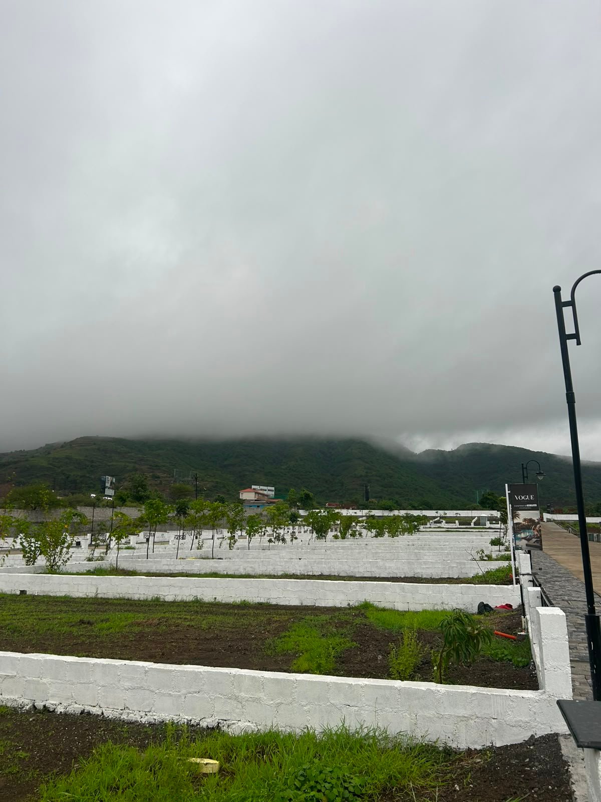 The Vana Estate — plotted development with monsoon hills